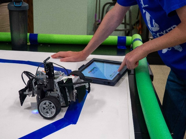 4-H with robot at camp 